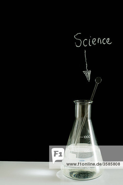 Becherglas und das Wort Wissenschaft