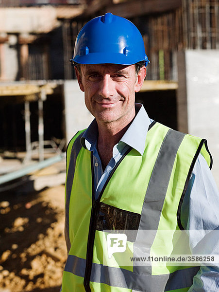 Mature man on construction site  portrait