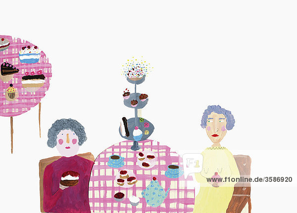 Zwei Frauen am Tisch mit Kaffee und Kuchen