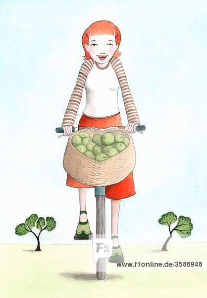 Frau fährt Fahrrad mit einem Korb voller Äpfel
