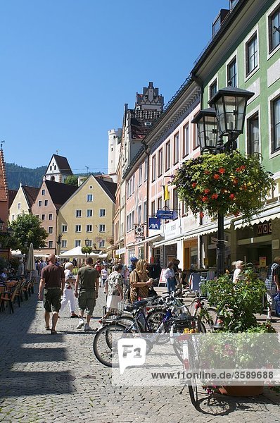 Pedestrian zone with Abbey Saint Mang and Hohes Schloss  Fuessen  Bavaria  Germany  Europe