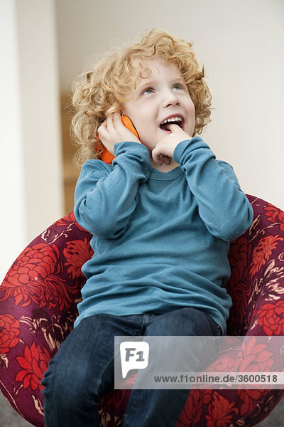Boy talking on a mobile phone