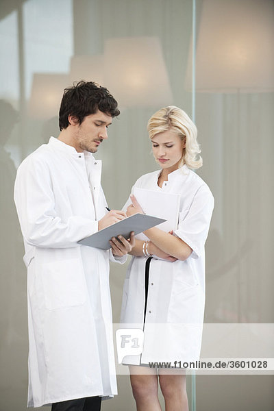 Doctors examining a medical report