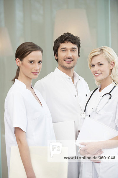 Portrait of three doctors smiling