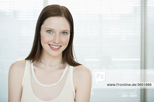 Businesswoman smiling in an office