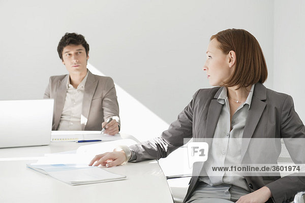 Business executives discussing in a conference room