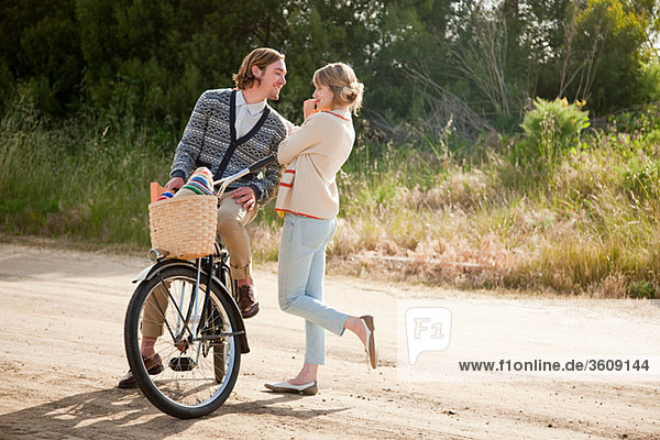Young couple with bicycle