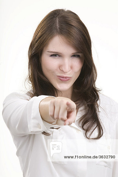 Woman pointing with her index finger