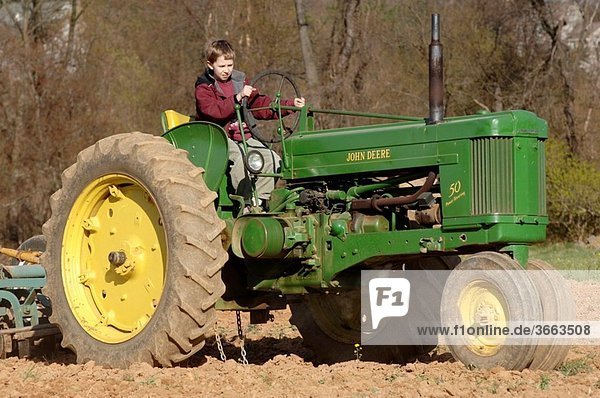 Boy on tractor