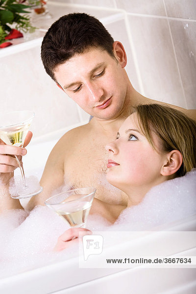 Young couple in the bathtub