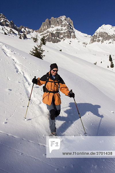 Snowshoe walker the Dachstein Mountains  Filzmoos  Salzburg  Austria  Europe