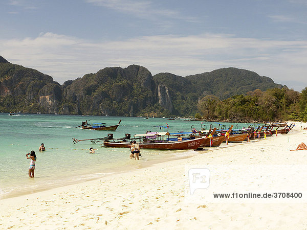 Long-tail boats on the beach of the island of Ko Phi Phi Don  Krabi Province  Andaman Sea  Thailand  Asia