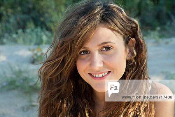 Young woman with long brown hair  portrait