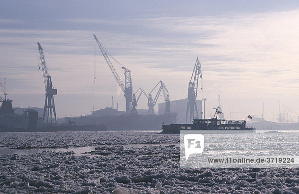 Ice drifting on river Elbe at Hamburg Habour Germany