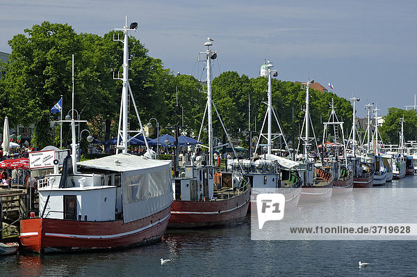 Fishing boats lying at Warnemuende harbour Germany