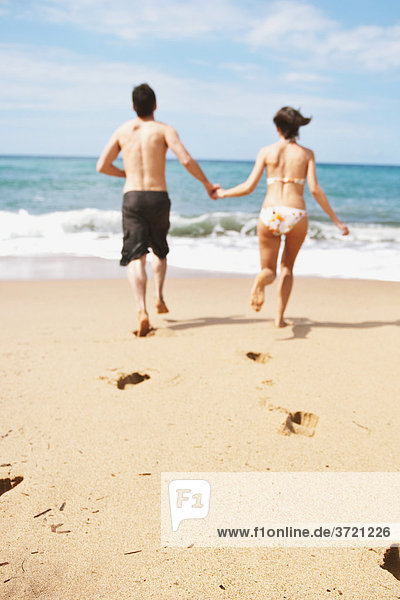 Couple On The Beach