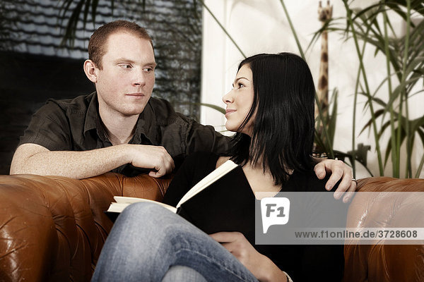 Young couple together in the living room