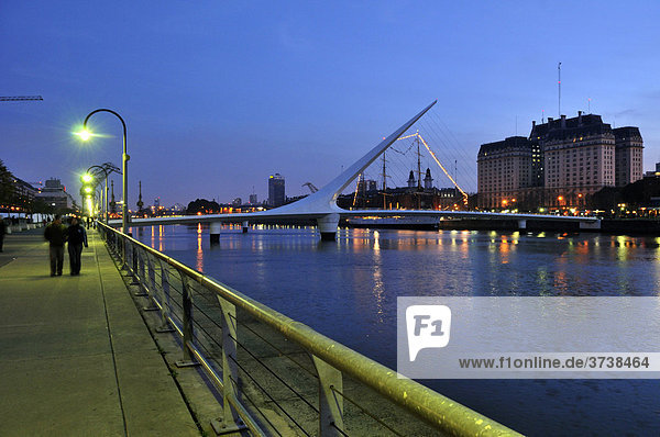 The old harbour Puerto Madero  restored for tourists  with the Puente de la Mujer  Woman's Bridge  evening  Buenos Aires  Argentina  South America