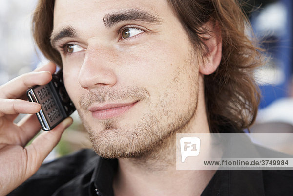 Young man phoning