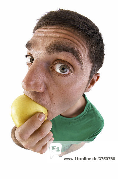Man biting into an apple  fish-eye lens