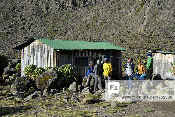 Local porters at mountain hut in Shipto's Camp (4200 m) Mount Kenya National Park Kenya