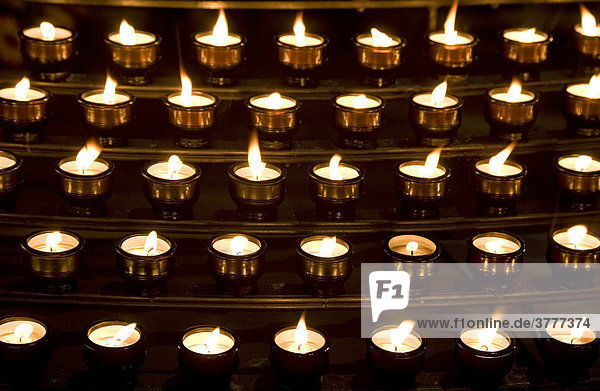 Many candles in a church - for All Saints' Day