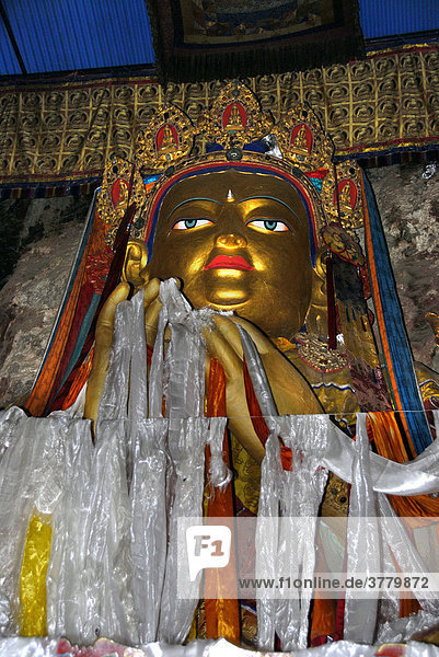 Tibetan Buddhism big figure of Buddha Maitreya in the temple Drak Yerpa Tibet China
