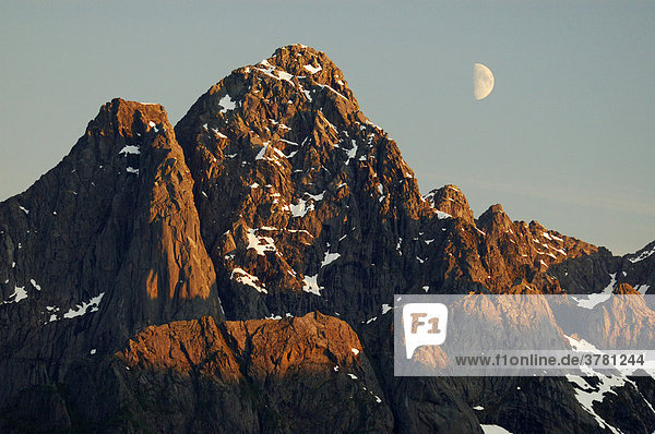 Mountain peak and half moon  near Svolvaer  Lofoten  Norway
