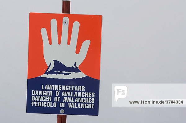 Warning sign about danger of avalanches