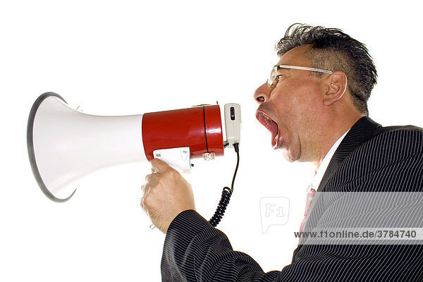 Business man screaming into a megaphone