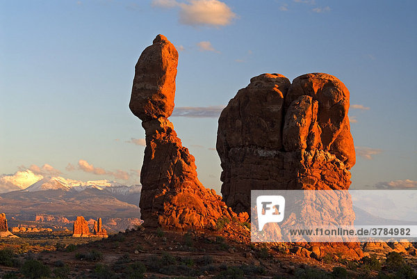 Balancing redrock boulder Balanced Rock at sunset Arches National Park Utah USA