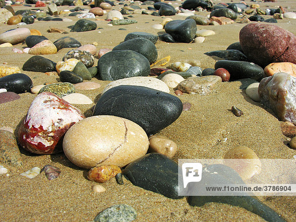 Colored pebbles in the sand