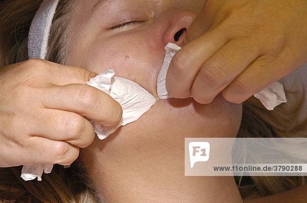 Young woman at a cosmetics treatment  squeeze out spots  pimples