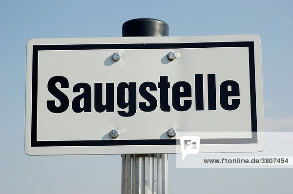 Sign Saugstelle at running water in a pond