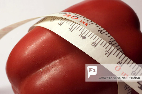 Tape measure and red pepper