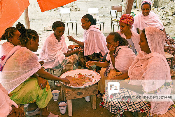 Africa  Eritrea  Massawa  women eating                                                                                                                                                              