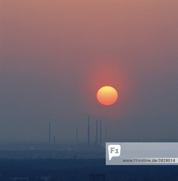 Sunset over industrial area  Karlsruhe  Baden-Wurttemberg  Germany
