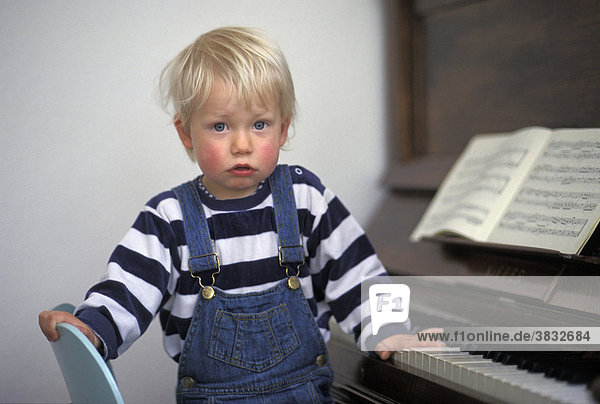 One-and-a-half-year-old boy at the piano