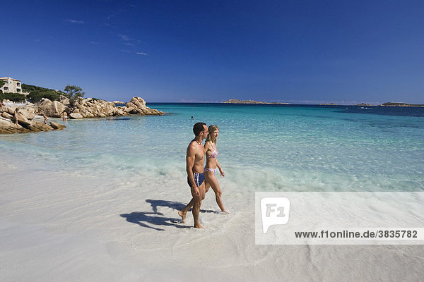 Couple Spiaggia Capriccioli Costa Smeralda Sardinia Italy