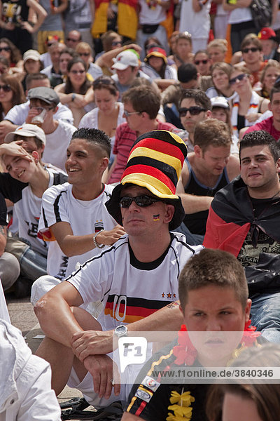 German soccer fans attending the public screening in front of the Olympic Stadium during the FIFA World Cup 2010  watching the match Germany vs Serbia  Berlin  Germany  Europe