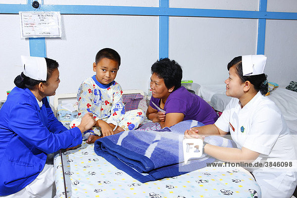 Boy in a hospital bed  nursing  hospital  Balinge  Batak region  Sumatra  Indonesia  Asia