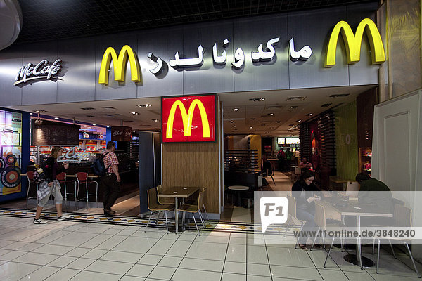 McDonalds name in Arabic script in the Duty Free  International Airport  departure hall  capital Manama  Kingdom of Bahrain  Persian Gulf