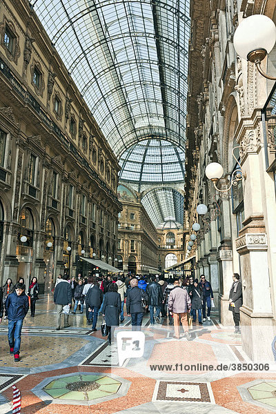 People walking in the Vittorio Emanuele Gallery  La Galleria  Milan  Italy  Europe
