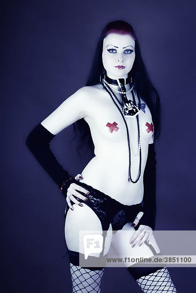 Woman  gothic look  naked breasts  standing