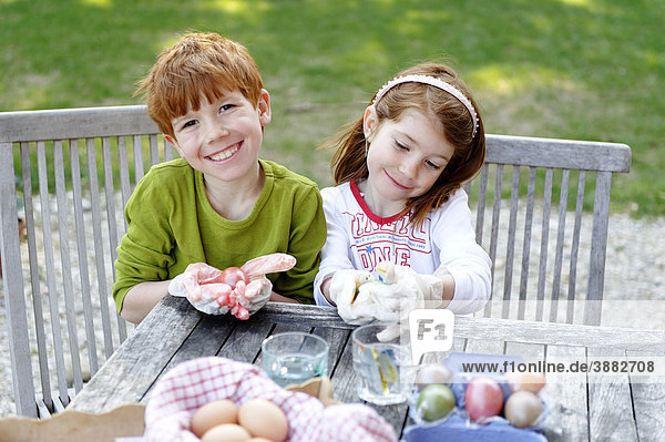 Children painting easter eggs  Easter preparation