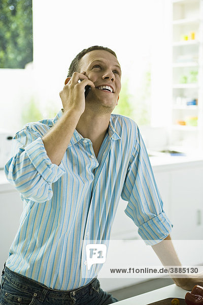 Man receiving good news with phone call