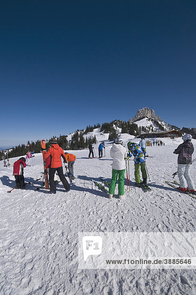 Winter sports enthusiasts get ready for departure near Mt. Kampenwand  Aschau  Chiemgau  Bavaria  Germany  Europe