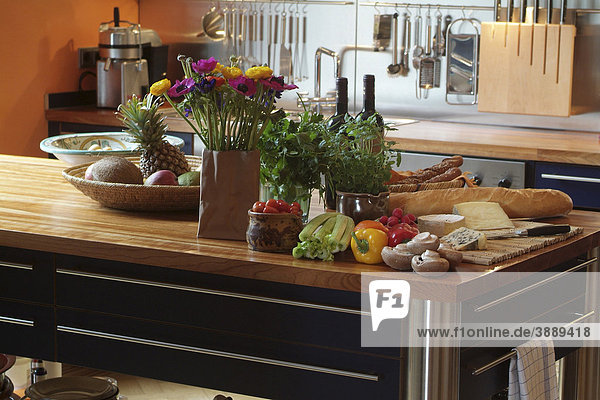 Still life with fresh vegetables  cheese and bread on a modern kitchen pantry in exclusive design