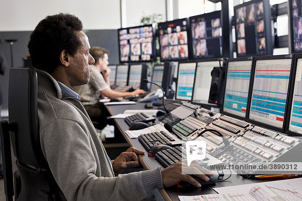 Technician at the Playout Center of ProSiebenSat.1 Media AG  where the network's program is being broadcasted  the program is stored digitally on a central in-house server  broadcast center  Unterfoehring  Bavaria  Germany  Europe