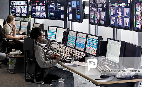 Technician at the Playout Center of ProSiebenSat.1 Media AG  where the network's program is being broadcasted  the program is stored digitally on a central in-house server  broadcast center  Unterfoehring  Bavaria  Germany  Europe